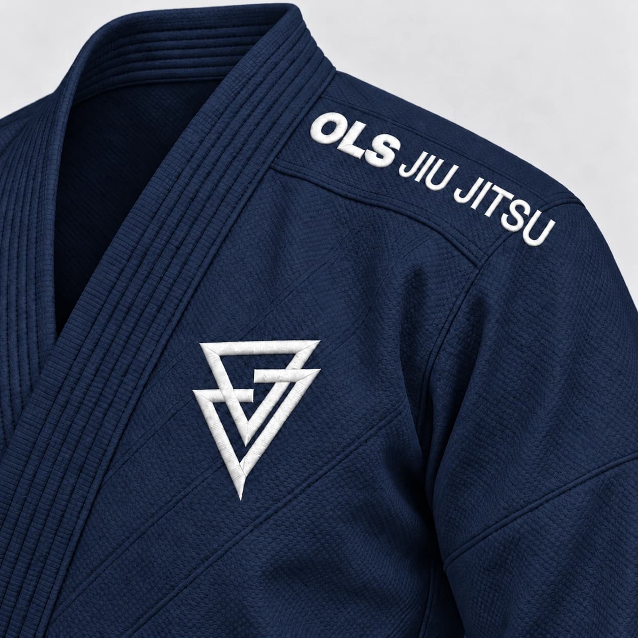 O símbolo no peito e a assinatura no ombro do Kimono OLS azul
