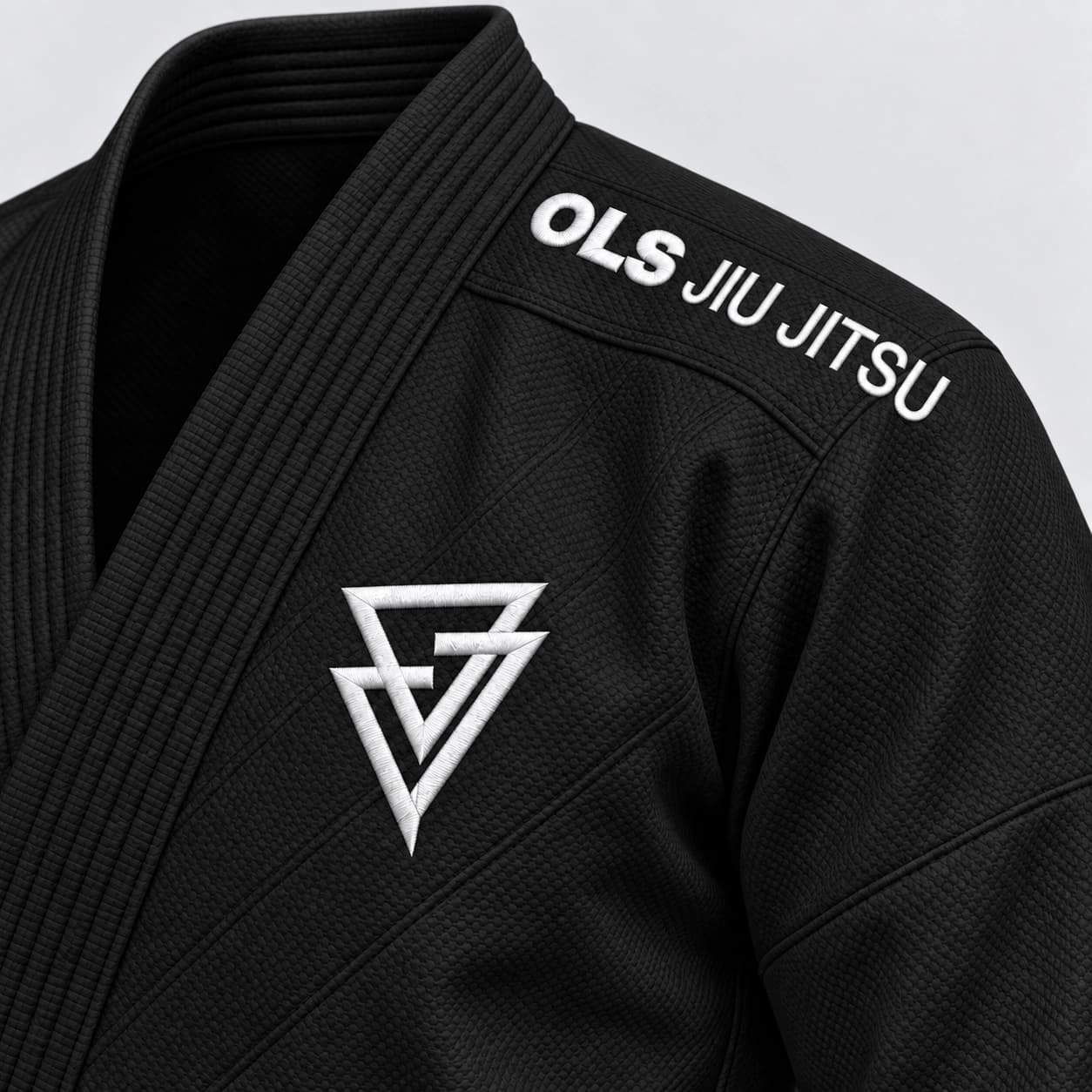 O símbolo no peito e a assinatura no ombro do Kimono OLS preto